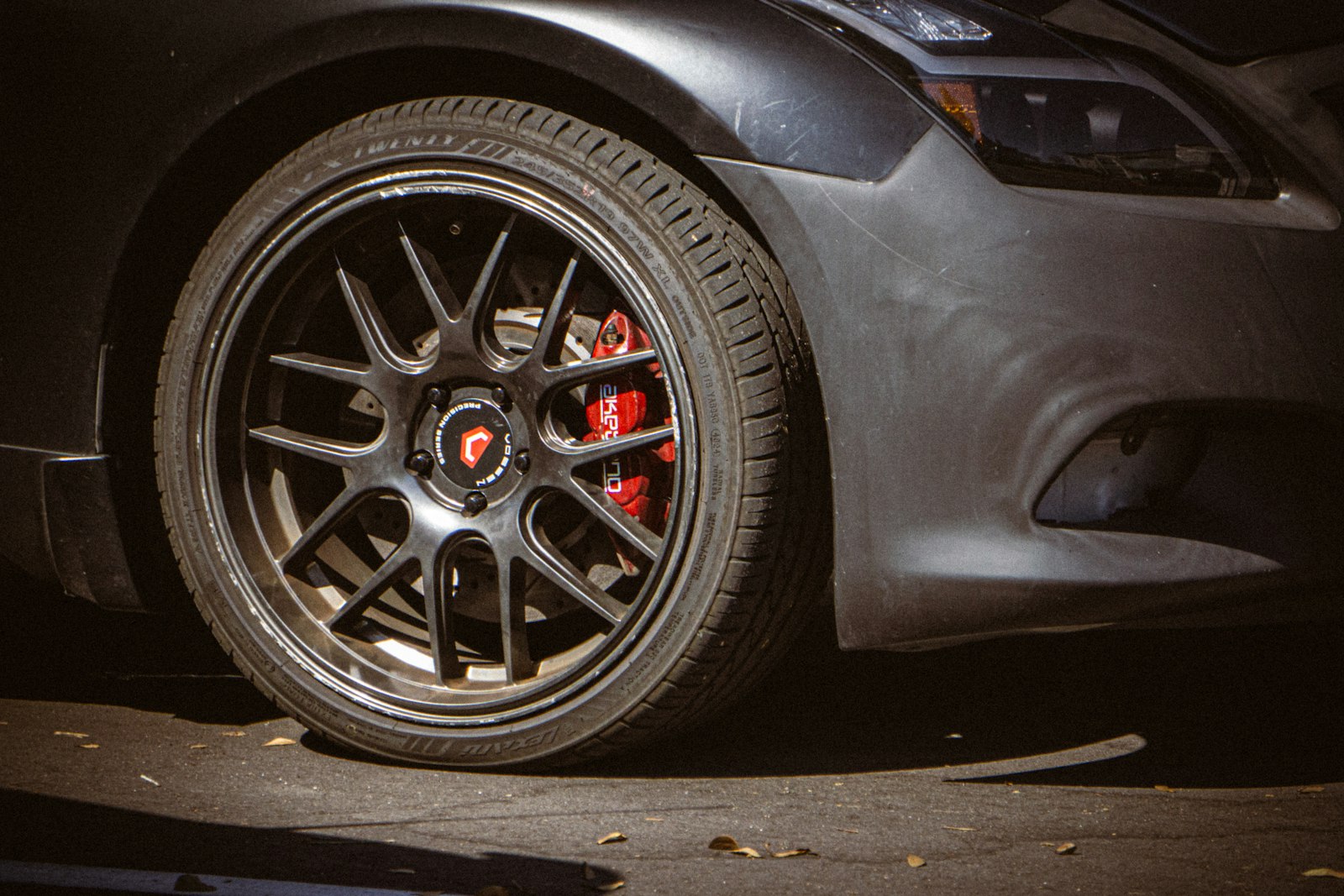 Brake disc and caliper checked during an MOT