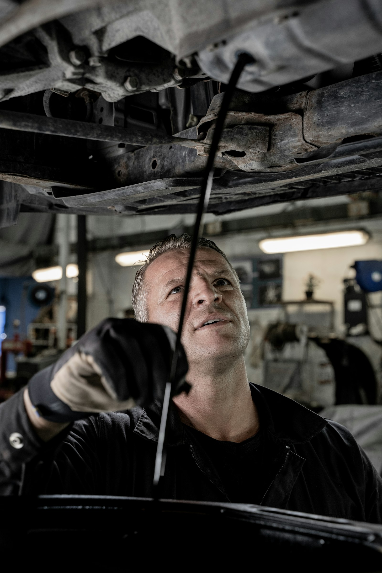 MOT tester inspecting a vehicle at Greenwood Test Centre Blackpool